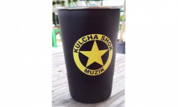 A black cup with yellow details